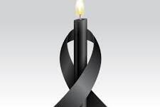 Nachruf, Schwarze brennende Kerze umschlungen von schwarzem Schleifenband